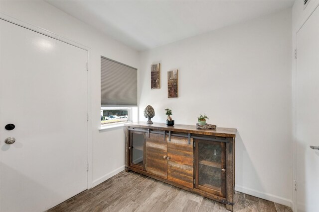 11306 Park Central Pl Unit D, Dallas, TX 75230 - interior space featuring light wood-type flooring and baseboards