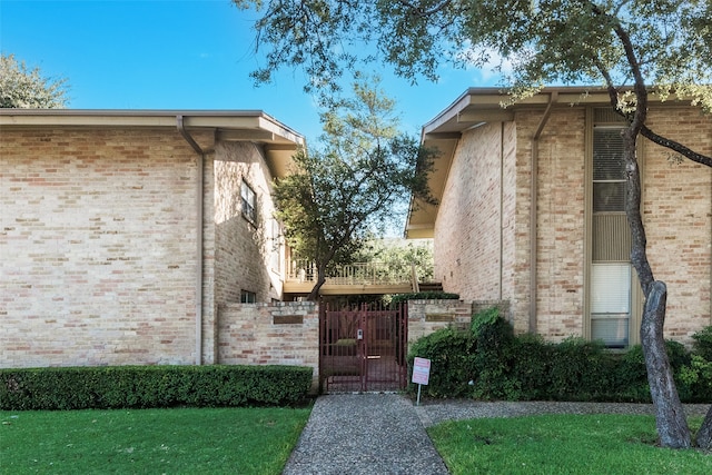 view of side of property with a yard