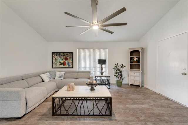 11306 Park Central Pl Unit D, Dallas, TX 75230 - living room featuring vaulted ceiling, ceiling fan, and wood finished floors