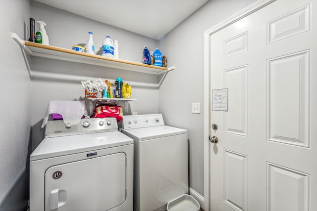 laundry room with washer and clothes dryer