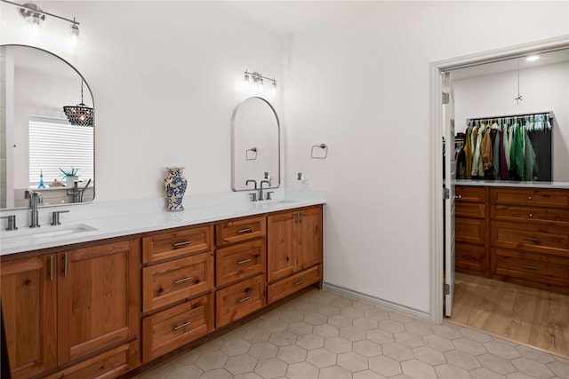 bathroom featuring wood-type flooring and vanity