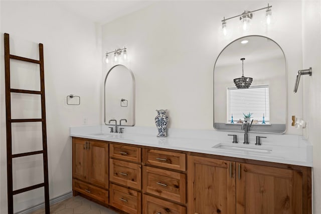 bathroom with vanity and tile patterned flooring