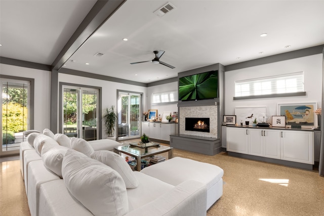 living room featuring ceiling fan