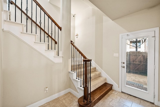 entrance foyer featuring light tile patterned floors