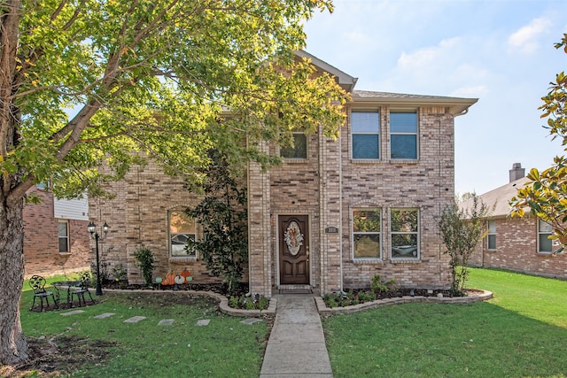 view of front of house with a front yard