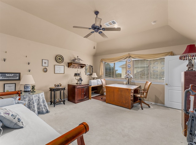 carpeted bedroom with vaulted ceiling and ceiling fan