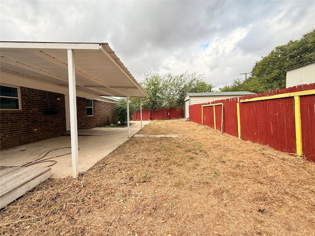 view of yard with a patio area