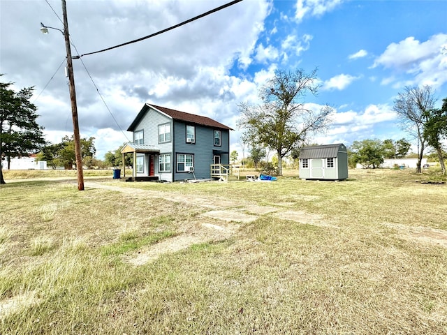 view of yard featuring a storage shed