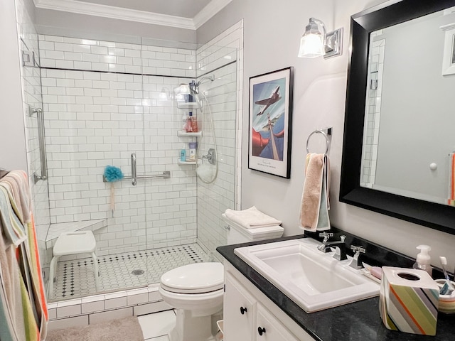 bathroom with a shower with door, tile patterned floors, toilet, ornamental molding, and vanity