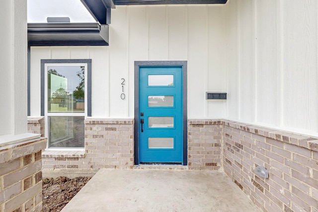 entrance to property with a patio