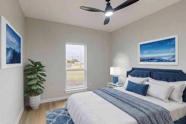 bedroom featuring wood-type flooring and ceiling fan