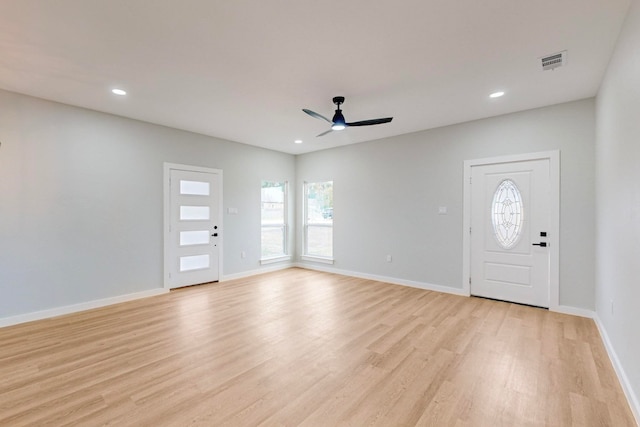 entrance foyer featuring light hardwood / wood-style flooring and ceiling fan