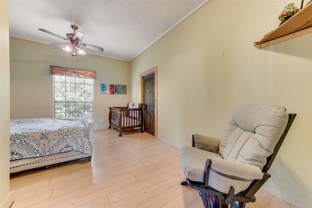 bedroom featuring ceiling fan and light wood-type flooring