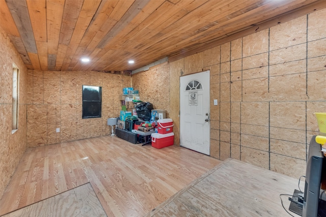 interior space featuring wooden ceiling and hardwood / wood-style flooring