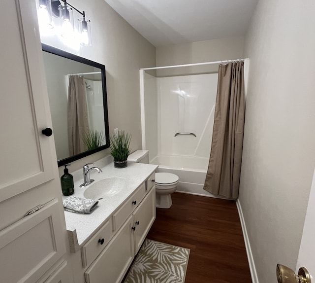 full bathroom featuring shower / bath combination with curtain, vanity, toilet, and hardwood / wood-style floors