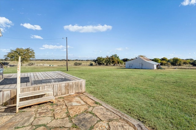 view of yard with a rural view