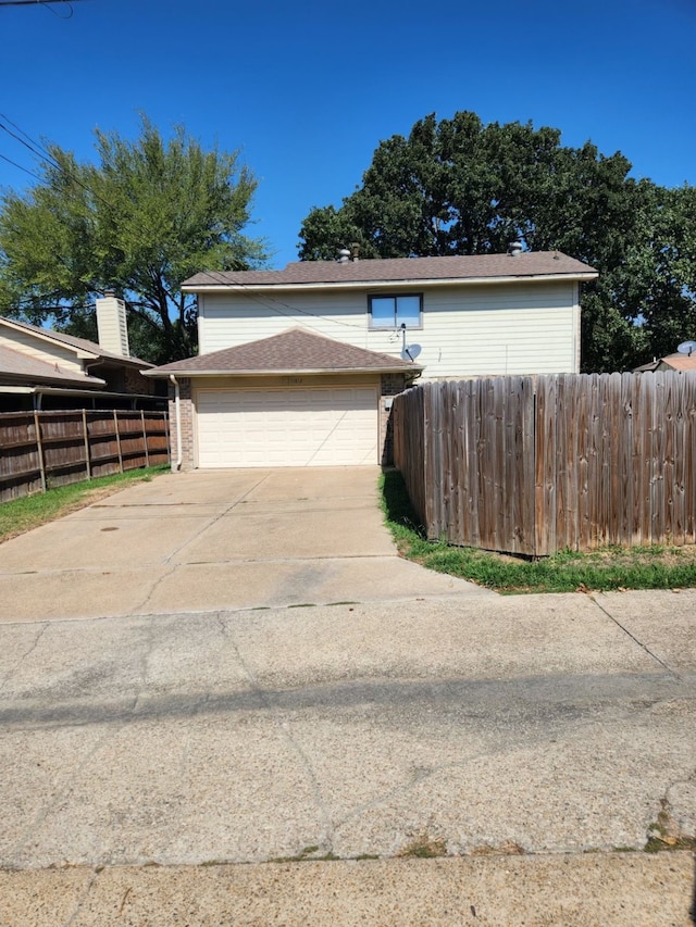 exterior space with a garage