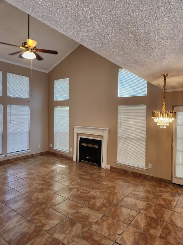 unfurnished living room featuring crown molding, high vaulted ceiling, a textured ceiling, and ceiling fan with notable chandelier