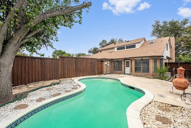 view of pool with a patio