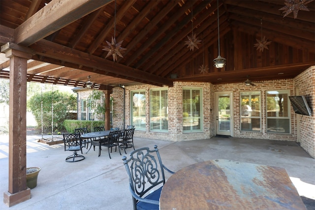 view of patio featuring ceiling fan