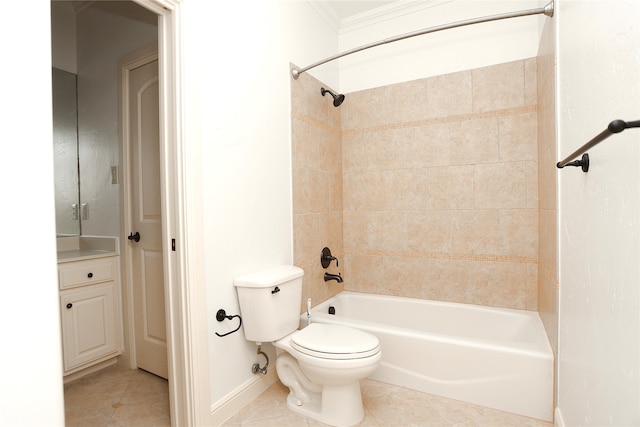 bathroom with tile patterned flooring, toilet, ornamental molding, and tiled shower / bath