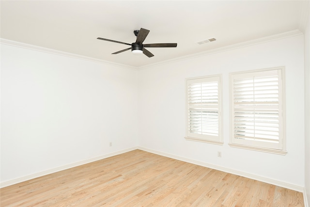 unfurnished room with ceiling fan, light hardwood / wood-style floors, and crown molding