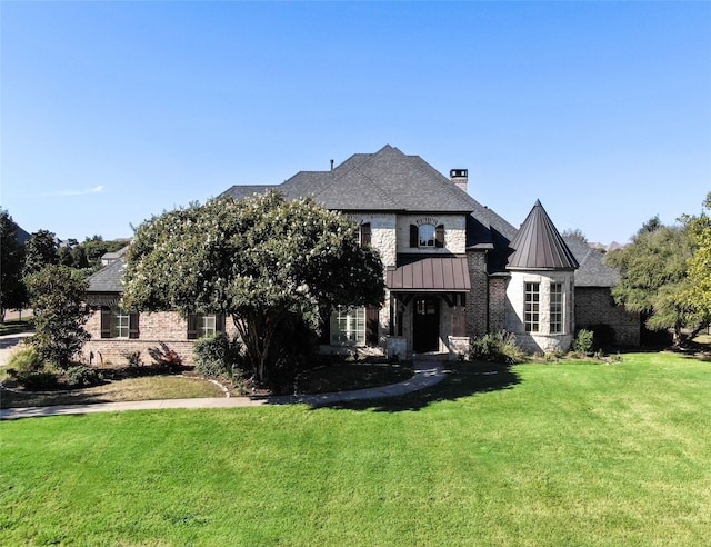 view of front of house featuring a front yard