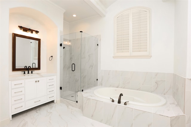 bathroom featuring plus walk in shower, vanity, and ornamental molding