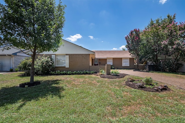 ranch-style house with a front lawn