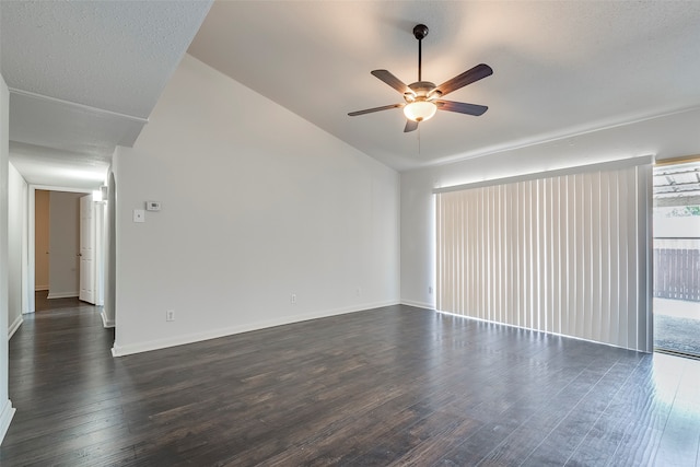 unfurnished room with ceiling fan, a textured ceiling, and dark hardwood / wood-style flooring