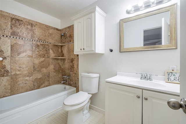 full bathroom featuring tiled shower / bath, a textured ceiling, toilet, vanity, and tile patterned flooring