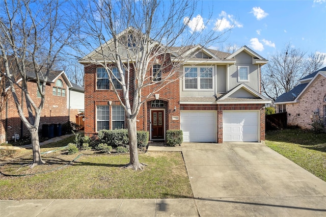 view of front of home featuring a front lawn and a garage