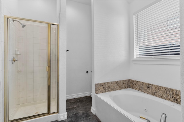 bathroom featuring independent shower and bath and tile patterned flooring