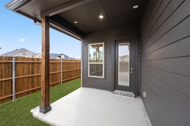 view of patio with fence