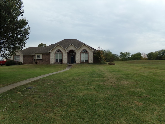 view of front of house with a front yard