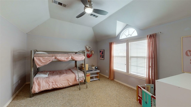 bedroom with light colored carpet, ceiling fan, and lofted ceiling