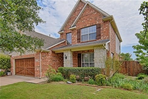 view of front of home with a front yard