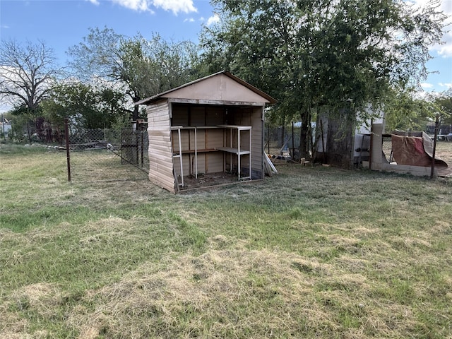 view of outdoor structure with a yard