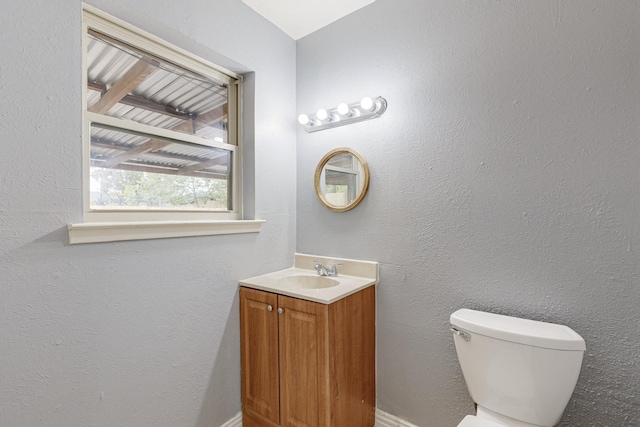 12304 Knight Dr, Balch Springs, TX 75180 - bathroom with toilet and vanity