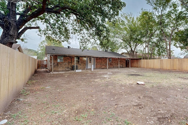 view of yard with a patio area and central AC unit