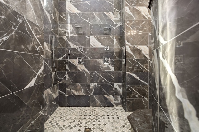 bathroom featuring tiled shower