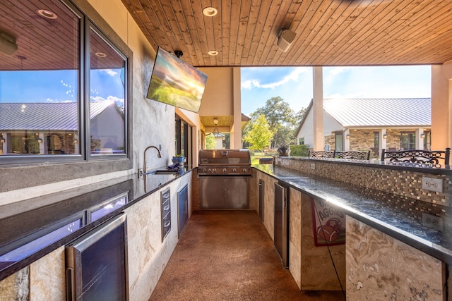 view of patio / terrace featuring sink and a grill