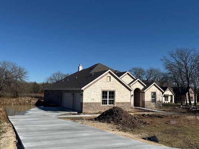 view of front of house with a garage