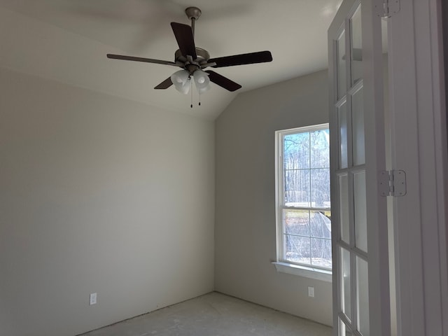 unfurnished room featuring ceiling fan and lofted ceiling