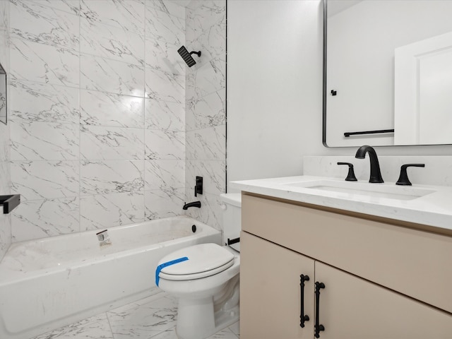 full bathroom featuring vanity, toilet, and tiled shower / bath