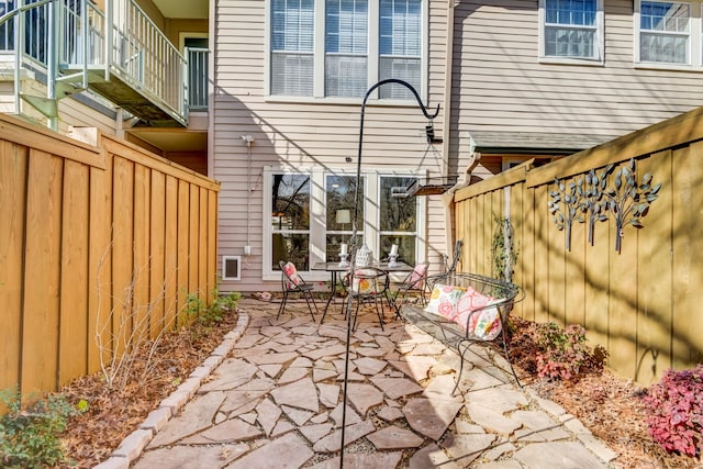 view of patio / terrace with a balcony