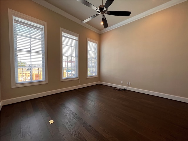 empty room featuring ornamental molding, dark hardwood / wood-style floors, and ceiling fan