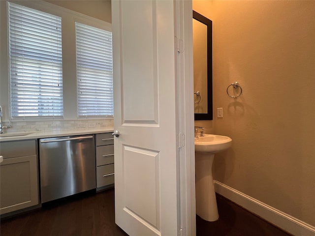 bathroom with sink and hardwood / wood-style flooring