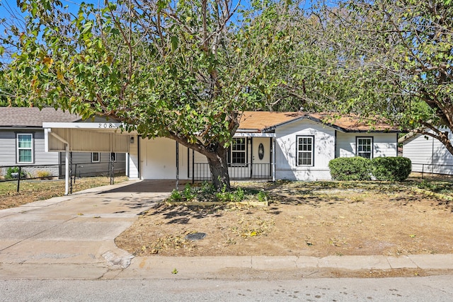 view of front of home featuring a carport