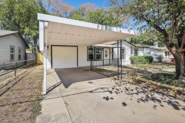 view of front facade with a carport